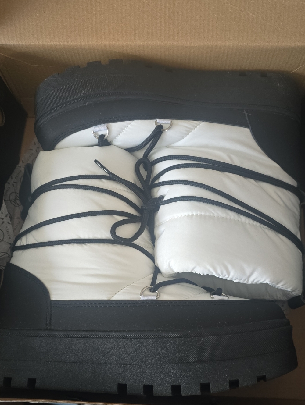White and Black Winter Boots